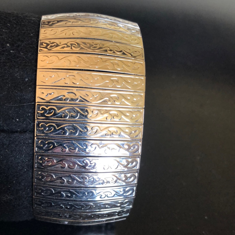 New silver tone stamped scroll design bracelet